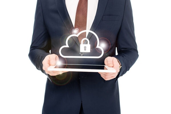 Businessman holding a tablet with a cloud and padlock icon, symbolizing secure cloud solutions for businesses