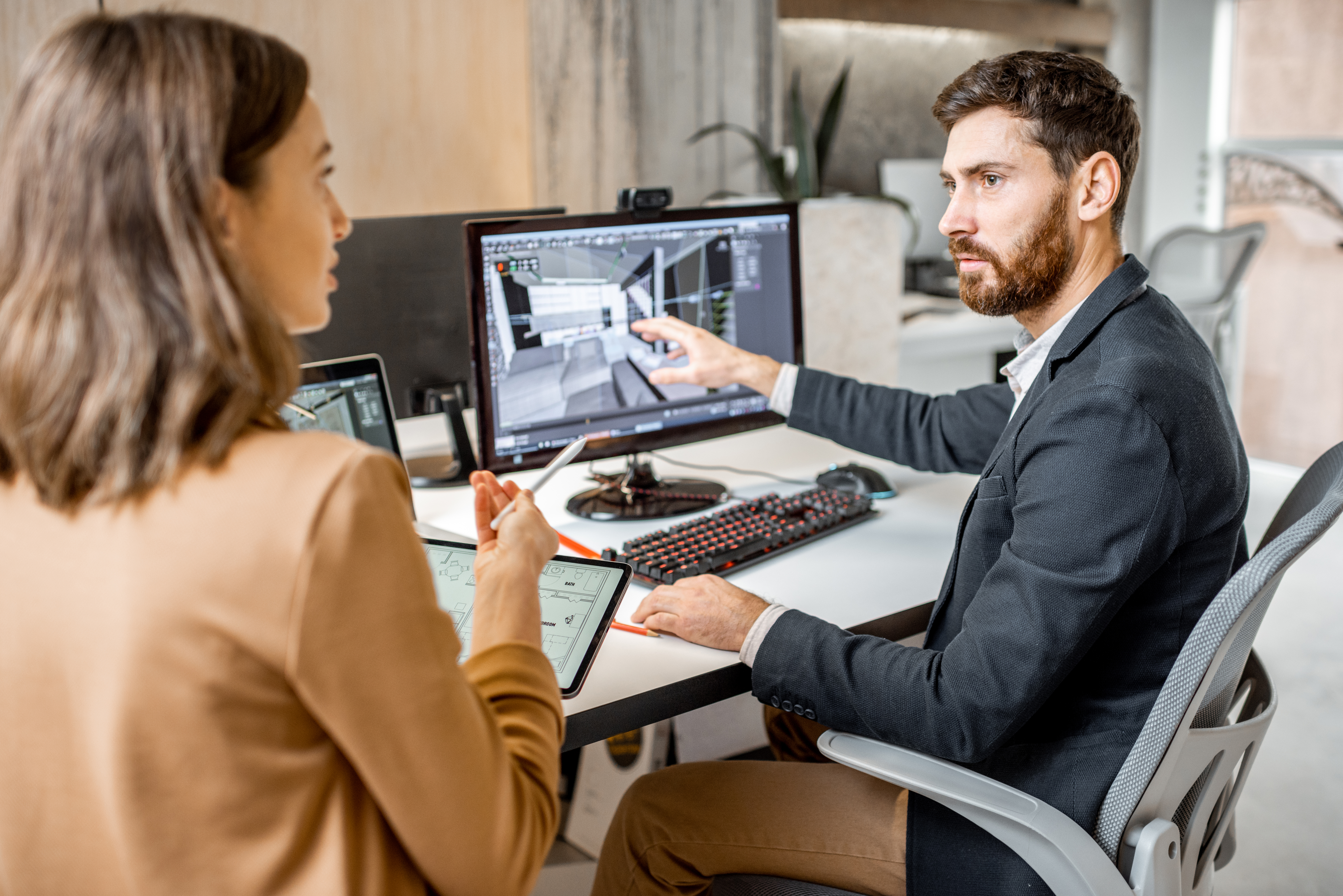 Two interior designers working in the office Young professionals during a meeting concept image for IT services for commercial real estate