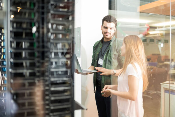 IT technicians working on network to increase the speed of internet connection.