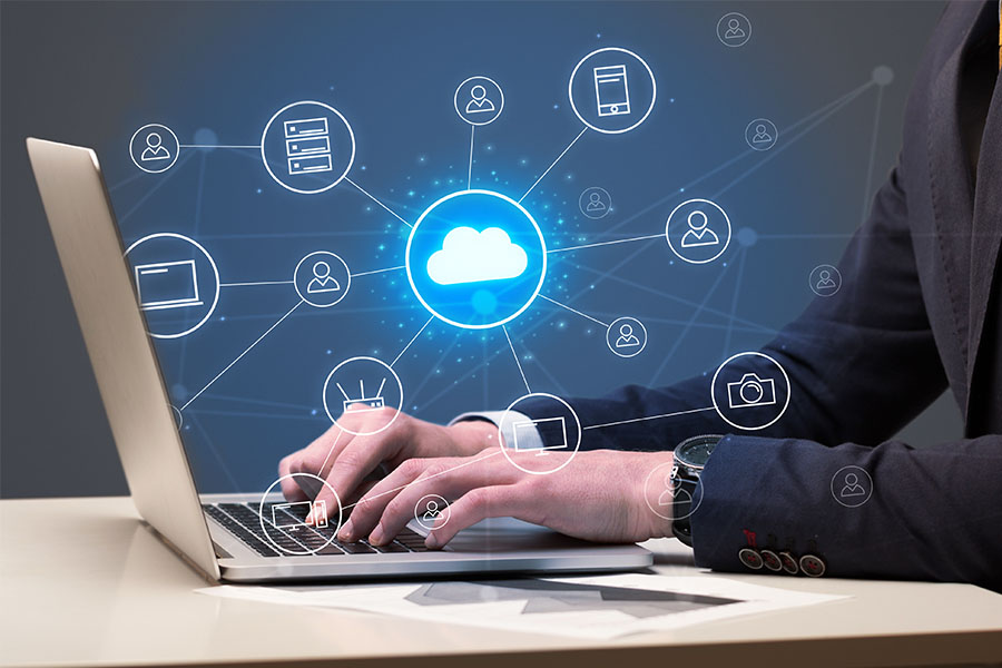 Man typing on laptop concept image for cloud solutions Man typing on laptop concept image for cloud solutions