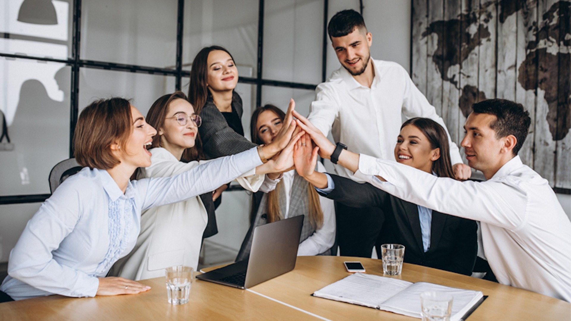 Project manager motivating her team during a strategic alignment project management meeting. Objectives project management is important because it ensures proper plan for executing strategic goals that is used by effective project managers.