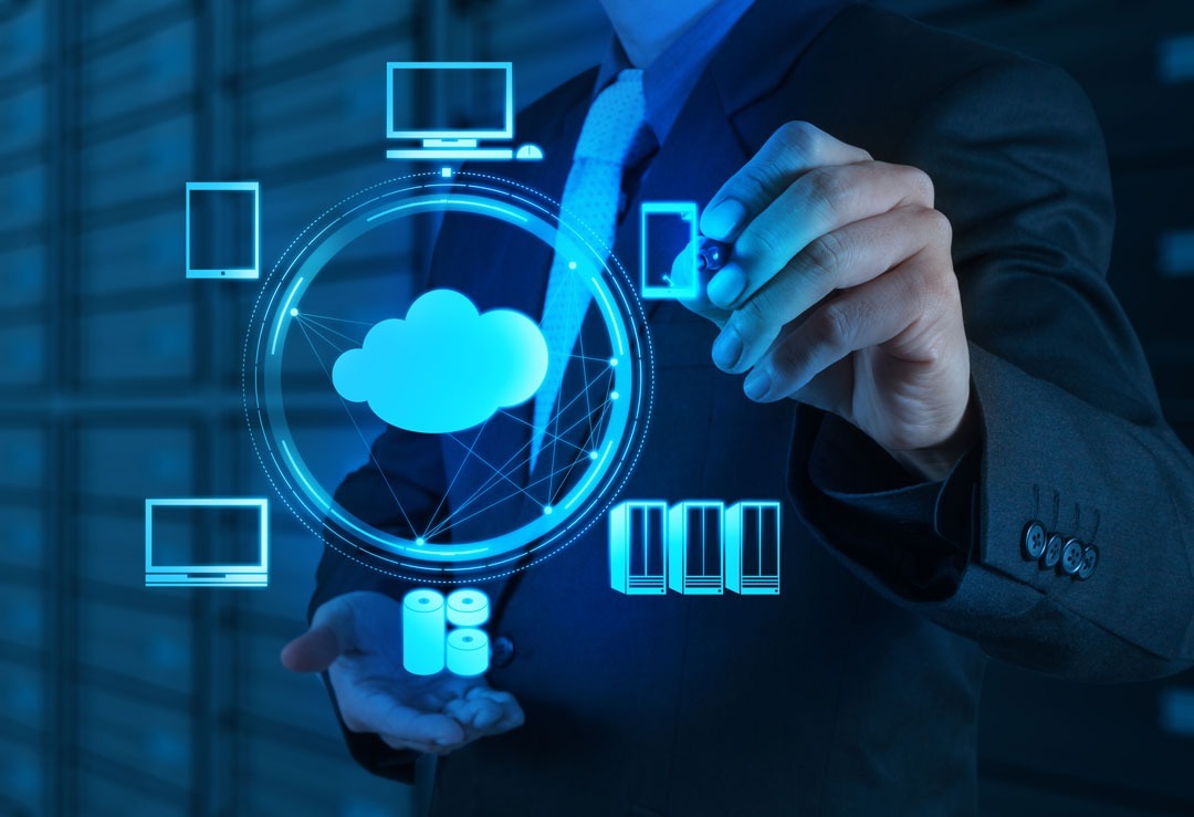 Business man pointing at cloud computing concept image for business cloud solutions
