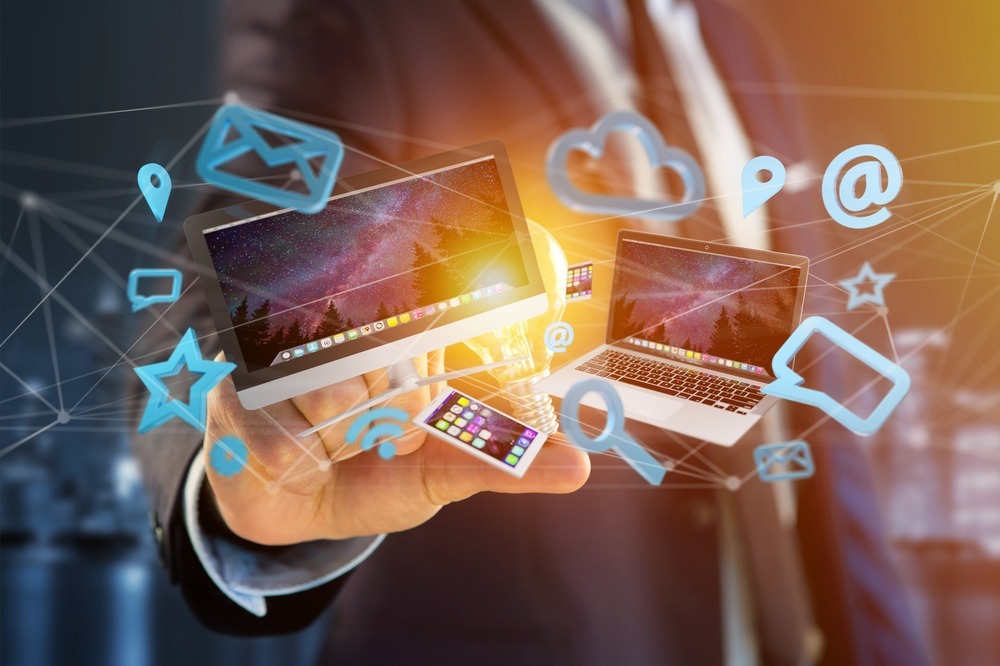 View of Devices like smartphone, tablet or computer flying over connected network